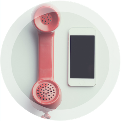 A mobile phone and an old landline phone